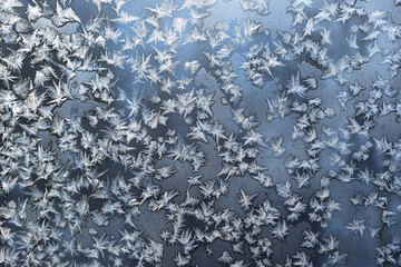 After severe frosts, winter patterns appeared on the windows of the houses. Russia, Moscow, January 2019.