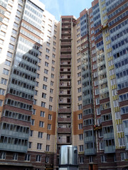 Fototapeta na wymiar Modern apartment building at summer