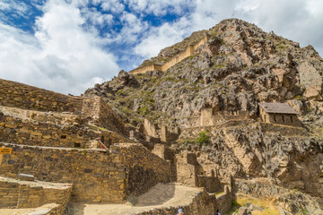 Fototapeta na wymiar View of inca archaeological site with the Sun Temple, Ollantaytambo, Peru