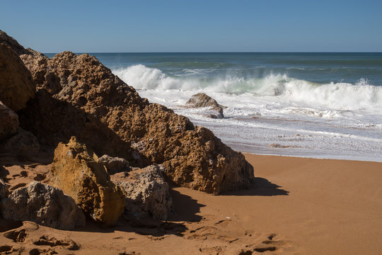 Rocks on the sandy beach, Lalla Fatna, Morocco