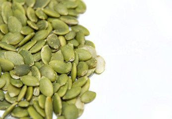 Green pumpkin seed isolated on white background