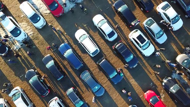 Top aerial view of many cars on sale car dealer market.