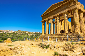 Fototapeta premium Ruined doric architecture of Greek Temple of Heracles or acropolis in ancient Valley of Temples, Agrigento