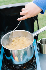 Close up of bow tie pasta, farfalle, cooking in a pot
