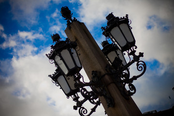 Fototapeta na wymiar Retro vintage street lamp lantern in a city.