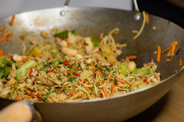 Chicken wok in pan ready to be eaten..​