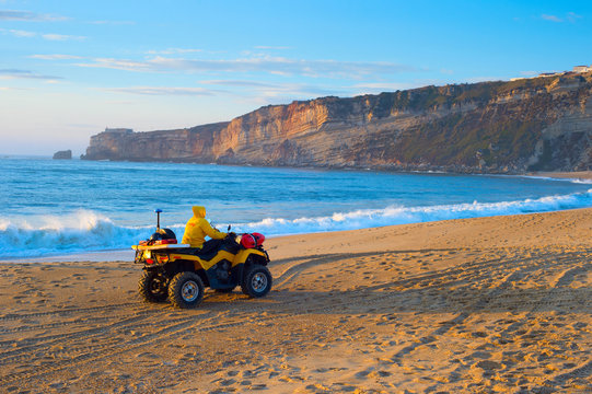 Lifeguard riding buggy beach Portugal