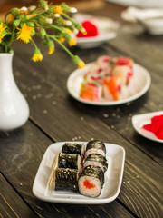 rolls and sushi set, mix different tastes. food background. top