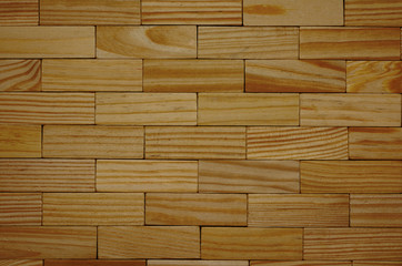 wooden surface consisting of the old boards laid by a geometrical ornament