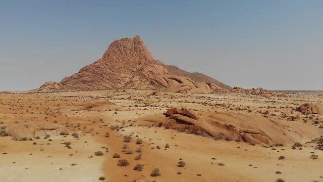 Arid desert landscape of Spitzkoppe mountain in Central Namibia, Aerial drone shot