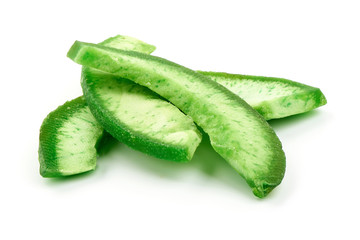Pieces of dried green pomelo or grapefruit, close-up, isolated on white background