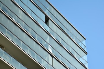 Fototapeta na wymiar Futuristic architecture of apartment building. Modern residential architecture