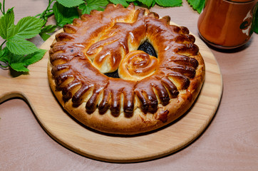 Pie with filling on the cutting board