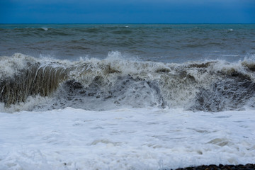 Stormy sea waves breaking near the coast