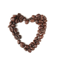 Roasted coffee beans in heart form, on white background. St Valentine day card
