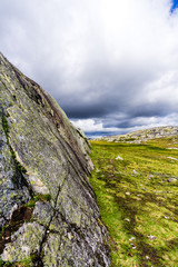 way across rock clouds sky