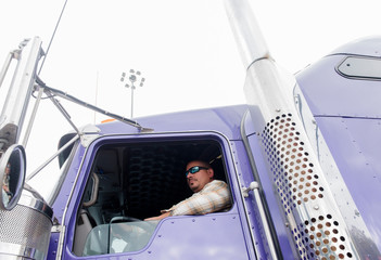 Man driving semi-truck