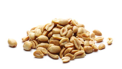 Fried and salted peanuts pile isolated on white