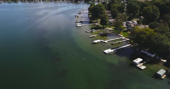 Aerial Drone Video of Michigan Lake Shoreline Living with residential docks