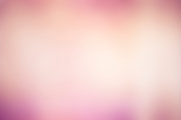 abstract defocused lights, sparkling holiday bokeh background with golden pastel pink tones, elegant christmas backdrop