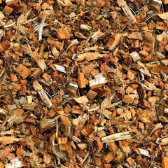 Texture of red sawdust, seamless pattern