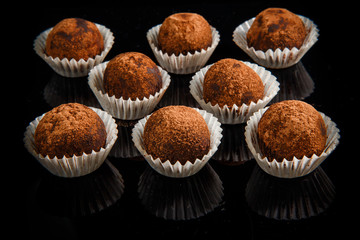 closeup group of useful handmade round chocolate candies