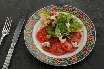 Healthy salad with fresh tomato