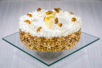 Homemade cake made with cream and walnuts.