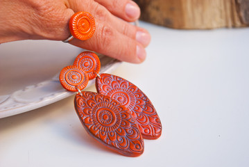 Handmade jewelry from polymer clay. Boho  Ethnic earrings and ring. Fashion jewelry.Still life
