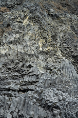 Basalt volcanic rock formations in Reinisfjara beach near Vik in northern Iceland