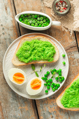 green peas, avocado and vegetable pate - sandwich (healthy breakfast). food concept. top view
