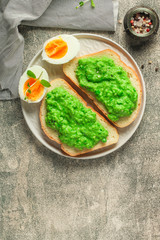 green peas, avocado and vegetable pate - sandwich (healthy breakfast). food concept. top view