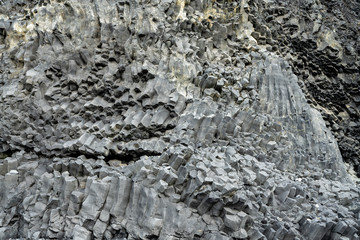 Basalt volcanic rock formations in Reinisfjara beach near Vik in northern Iceland