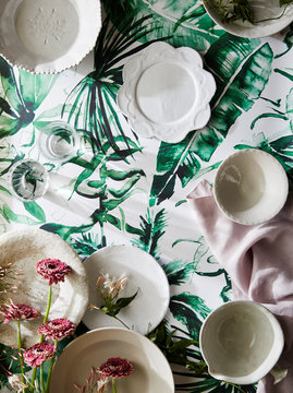 Plates on Floral Wallpaper