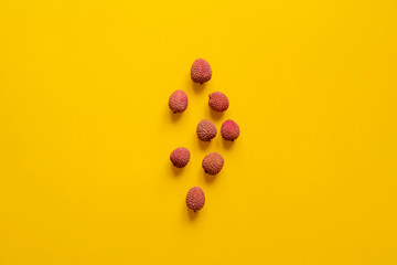 fresh lychees on yellow background isolated text mockup b