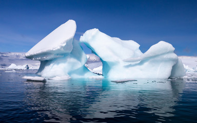 Iceberg in calm water