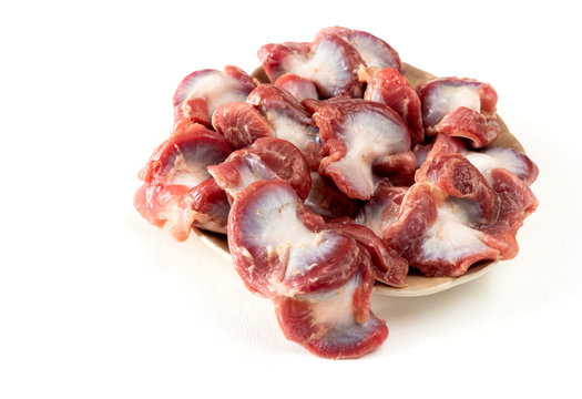 Raw Chicken gizzards isolated on white background.