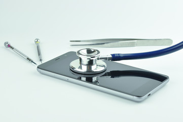 Smartphone and stethoscope.