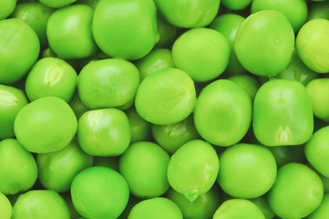 Fresh green peas background texture.