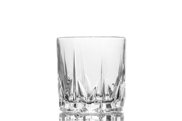 Whiskey glasses on a white.