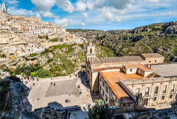 Obraz premium The steep cliffs and canyons of the ancient city of Matera, Italy, taken from the Madonna de Idris church in the Basilicata region.