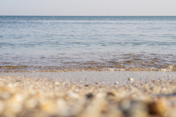 Calm sea in spring sunny day. Selective focus.