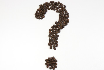 Question mark of coffee beans close up isolated on white . copy space. coffee beans on white background.