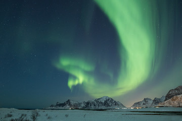 Fototapeta na wymiar Beautiful northern light display on Lofoten islands in winter