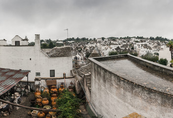 View of Alberobello picturesque village on a rainy day, Italy