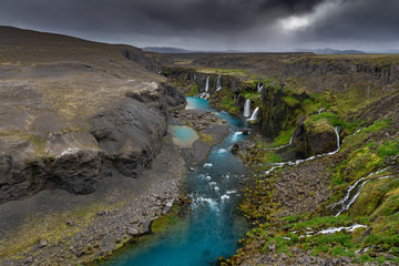 Iceland - Landmannalaugar - Valley of tears watefall canyon -Sigöldugljufur multiple waterfall canyon with storm approaching