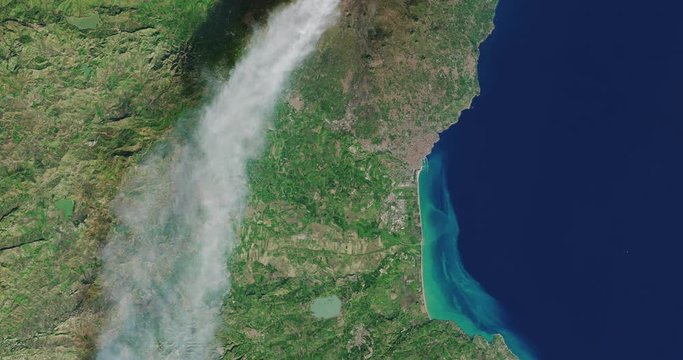 Very high-altitude overflight aerial of Mount Etna, erupting on its flank . Reversible, seamless loop. Elements of this image furnished by NASA. 