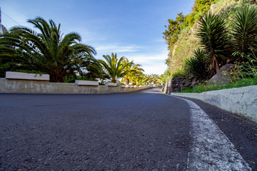 perspective photo of a winding country road