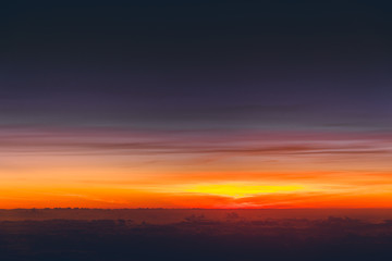 Sunset over the clouds, taken from an airplane