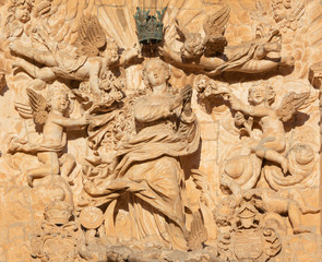 PALMA DE MALLORCA, SPAIN - JANUARY 27, 2019: The statue of Immaculate Conception on the baroque portal of church Iglesia de San Francisco by Pere Horrach and Francisco de Herrera (17. cent.).